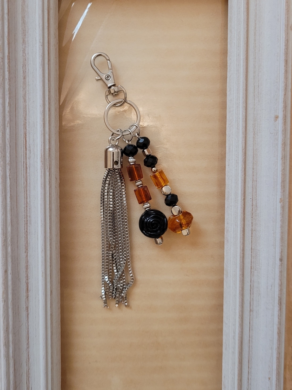 Silver Tassel Bag Charm with Black and Amber Beads